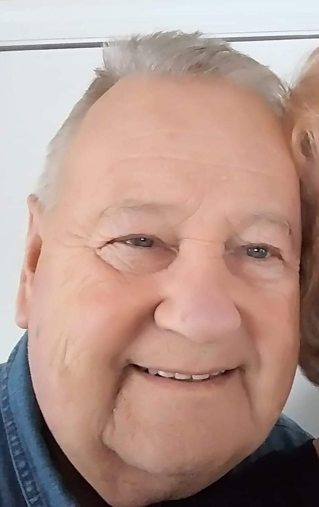 Charles E. Sagau