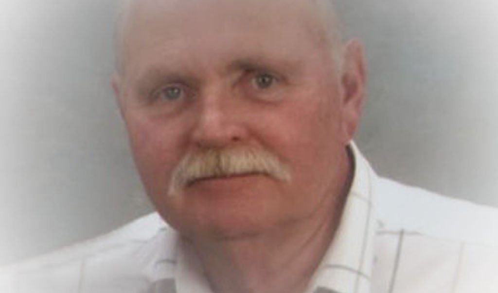 Travis E. Cooper