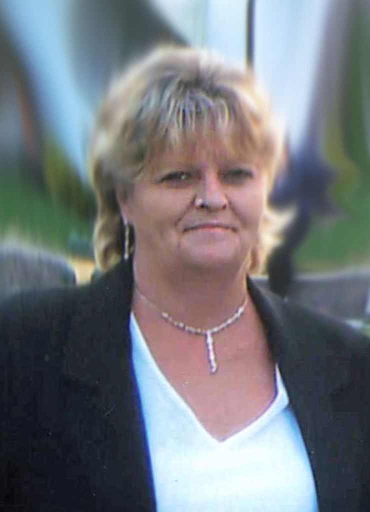 Cathy M. Grove