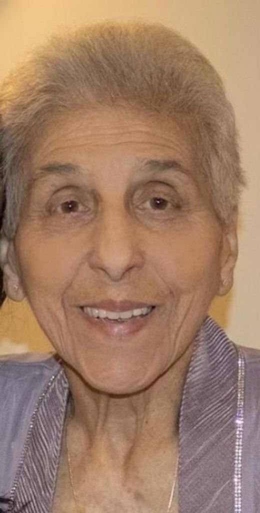 Suzanne 'Sue' M. Floro