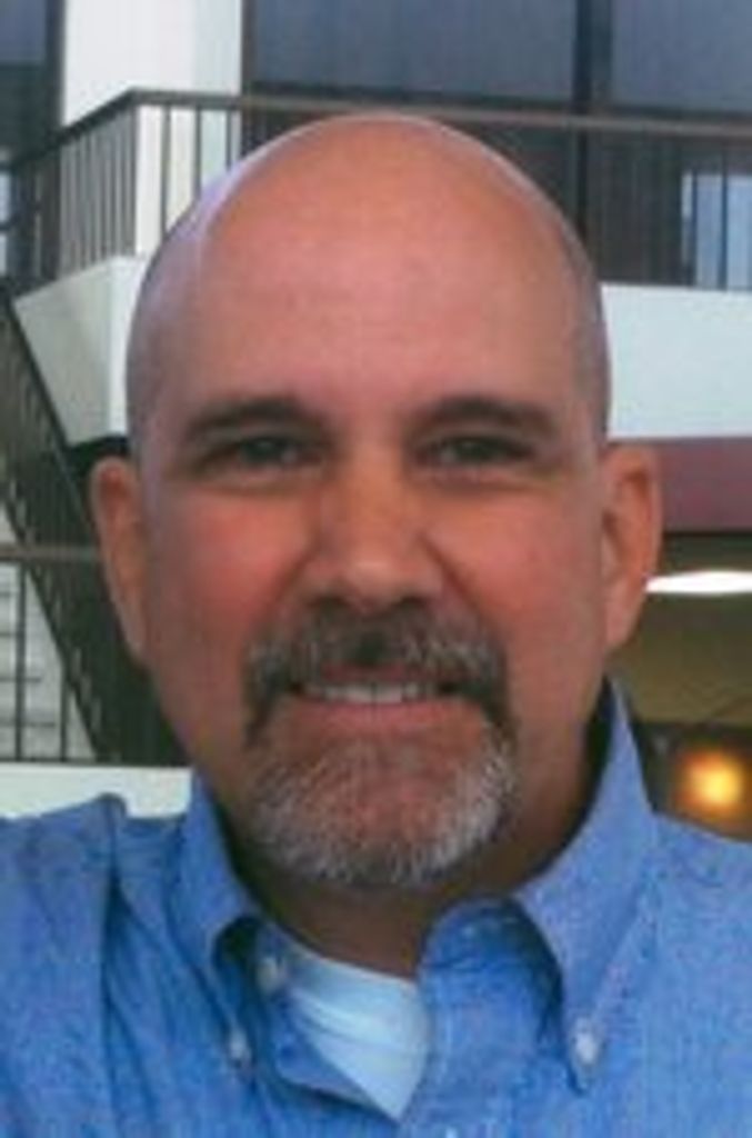 Dr. Tim Kemp