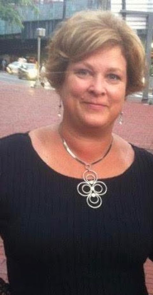 Genevieve J. Benton