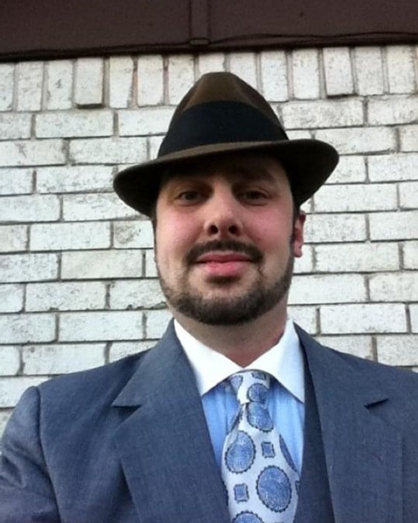 Justin Eugene Booth