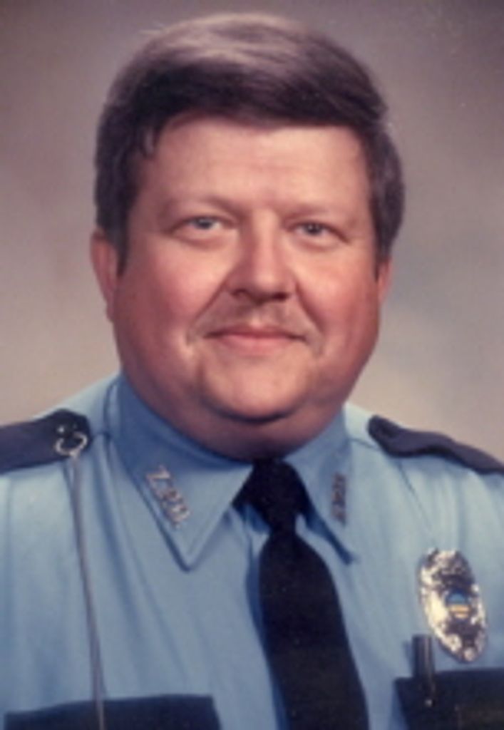 Gregory  L. Fisher