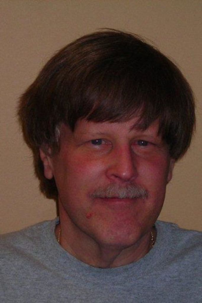 Charles E. “Chuck” Dixon Profile Photo