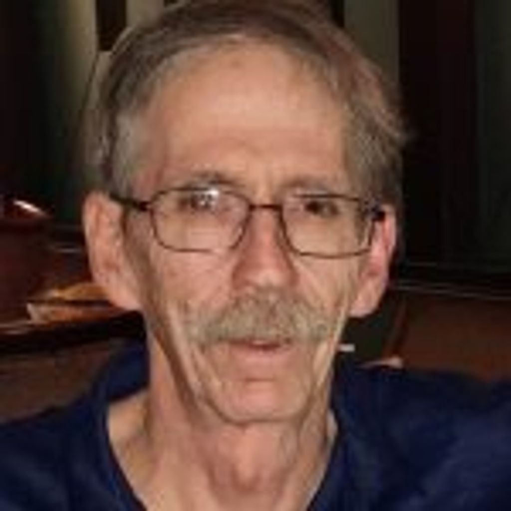 Mark E. Raines