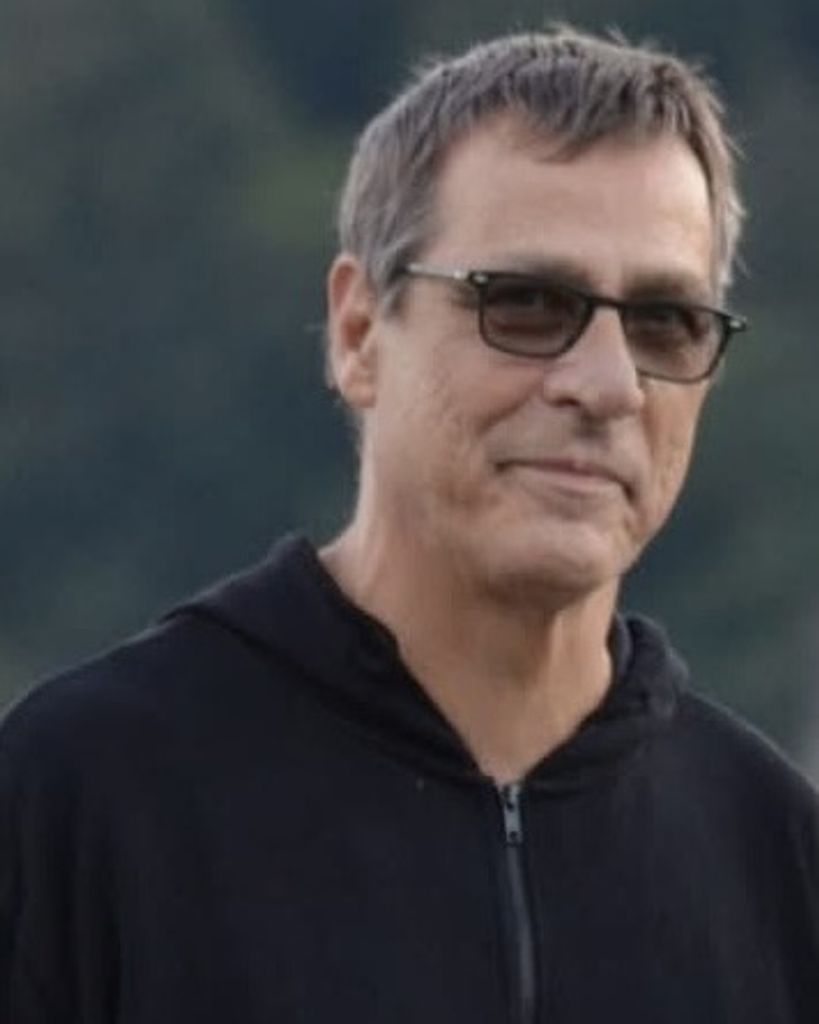 Thomas "Tom" J. Ernst