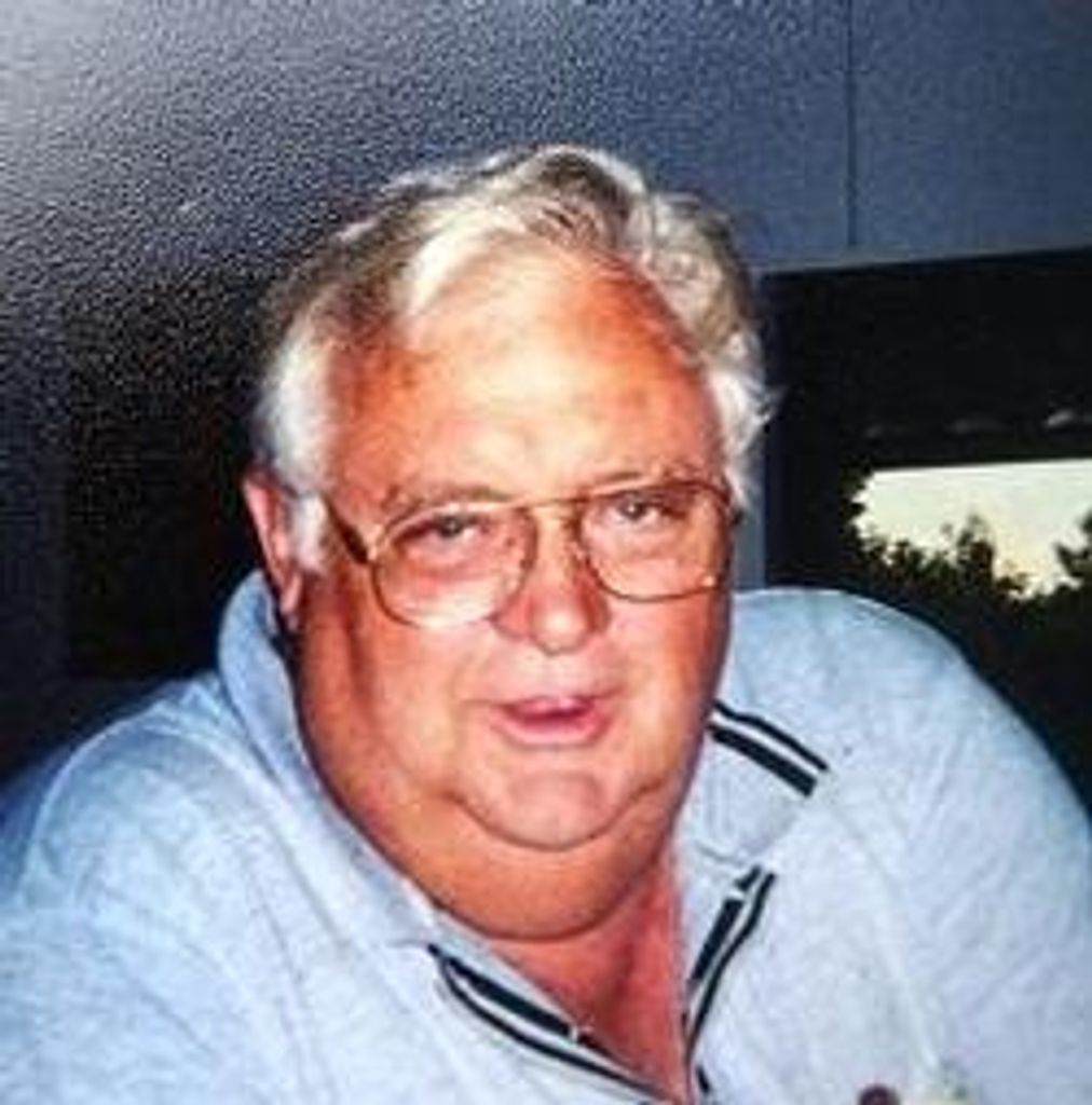 Raymond E Cox