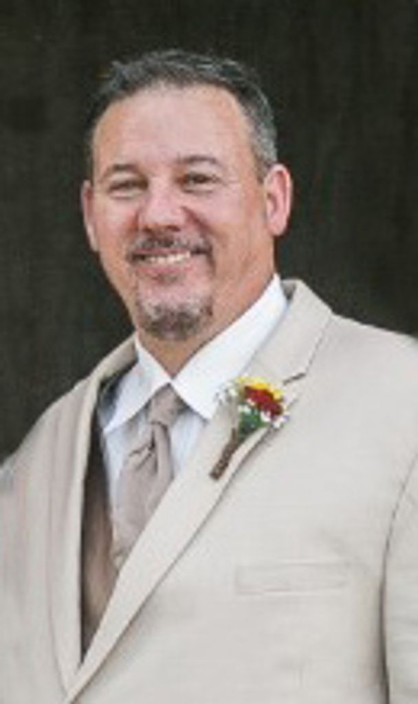 Kenneth “Ken” Amos