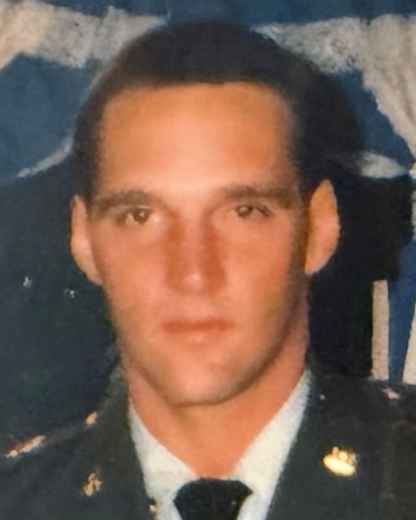 Elmer "Chris" H. Milsom