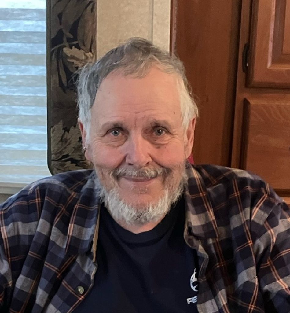 Dennis E. "Denny" George