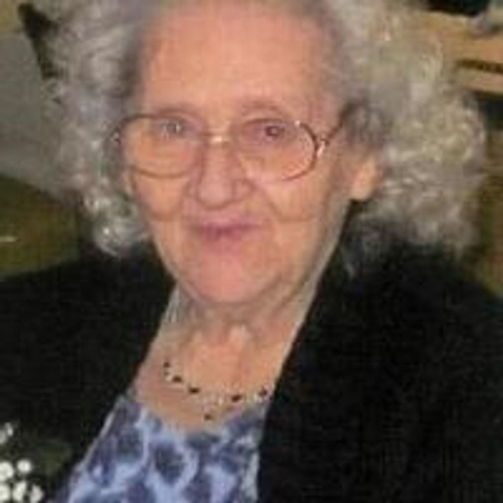 Dora E Caron