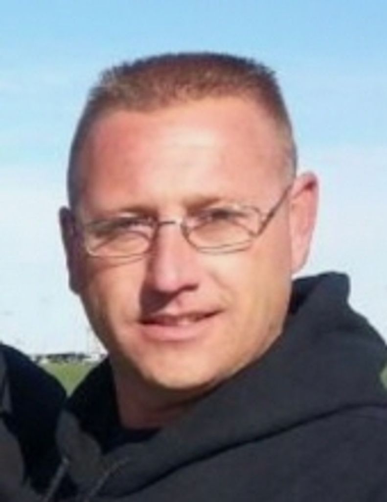 Derrick  E.  Hansman