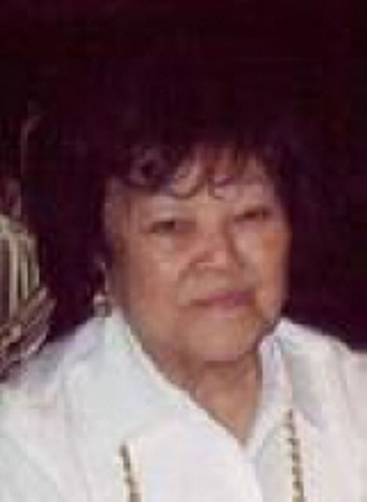 E.  Carol Whitton