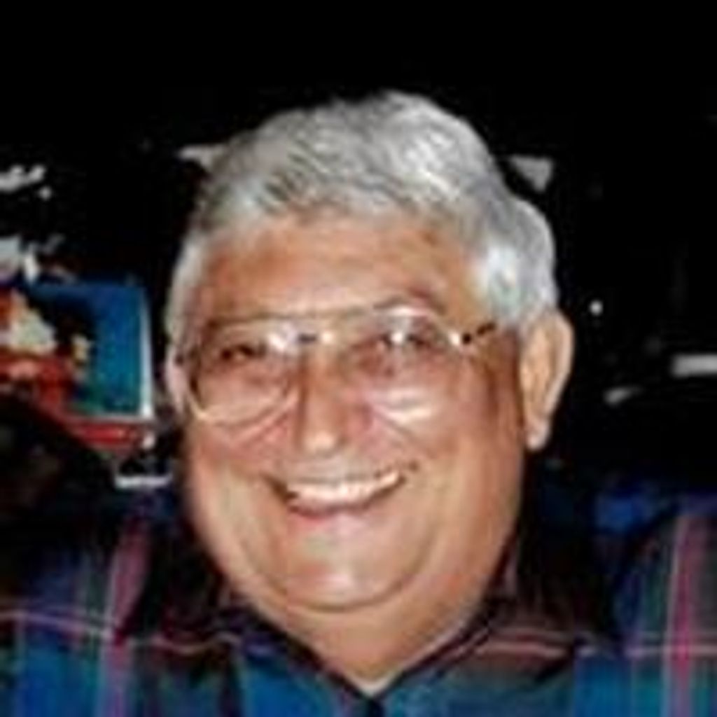 Roland E. Rollie Kerker