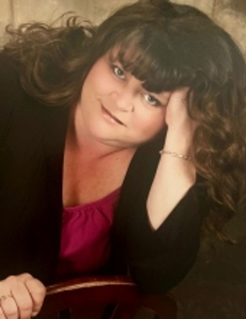Debra M. "Debi" Vande Zande
