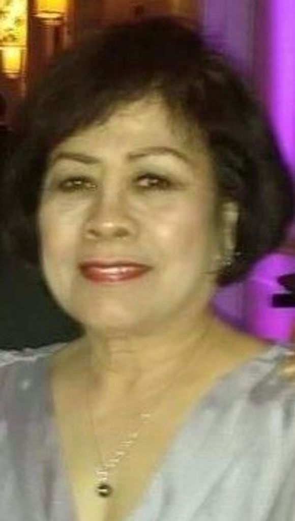 Isabel M. Dela Cruz