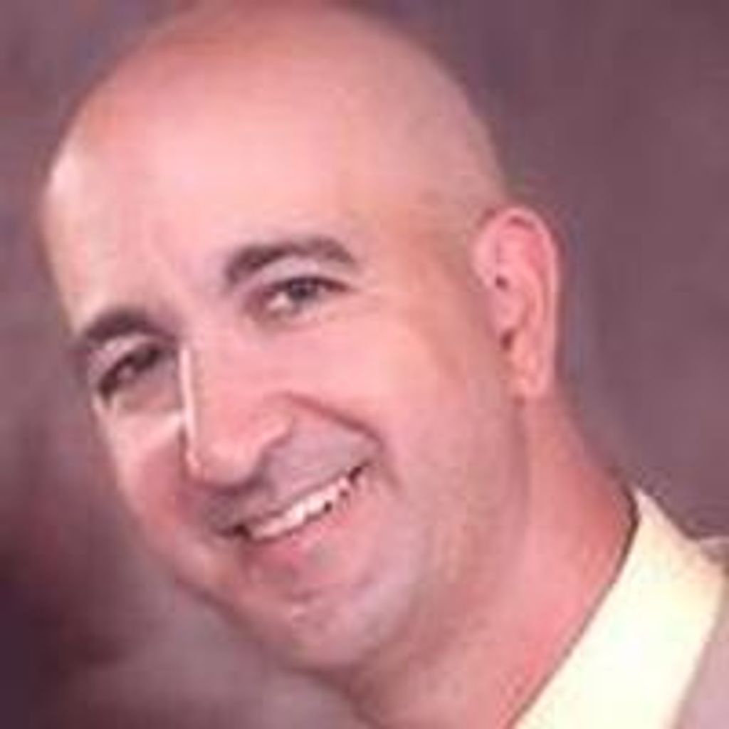 John P Carozza