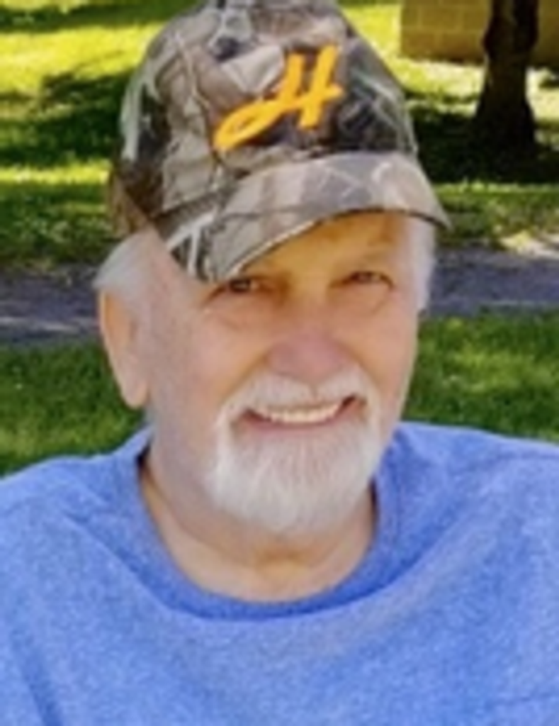 Earl E.  "Spike" Huber