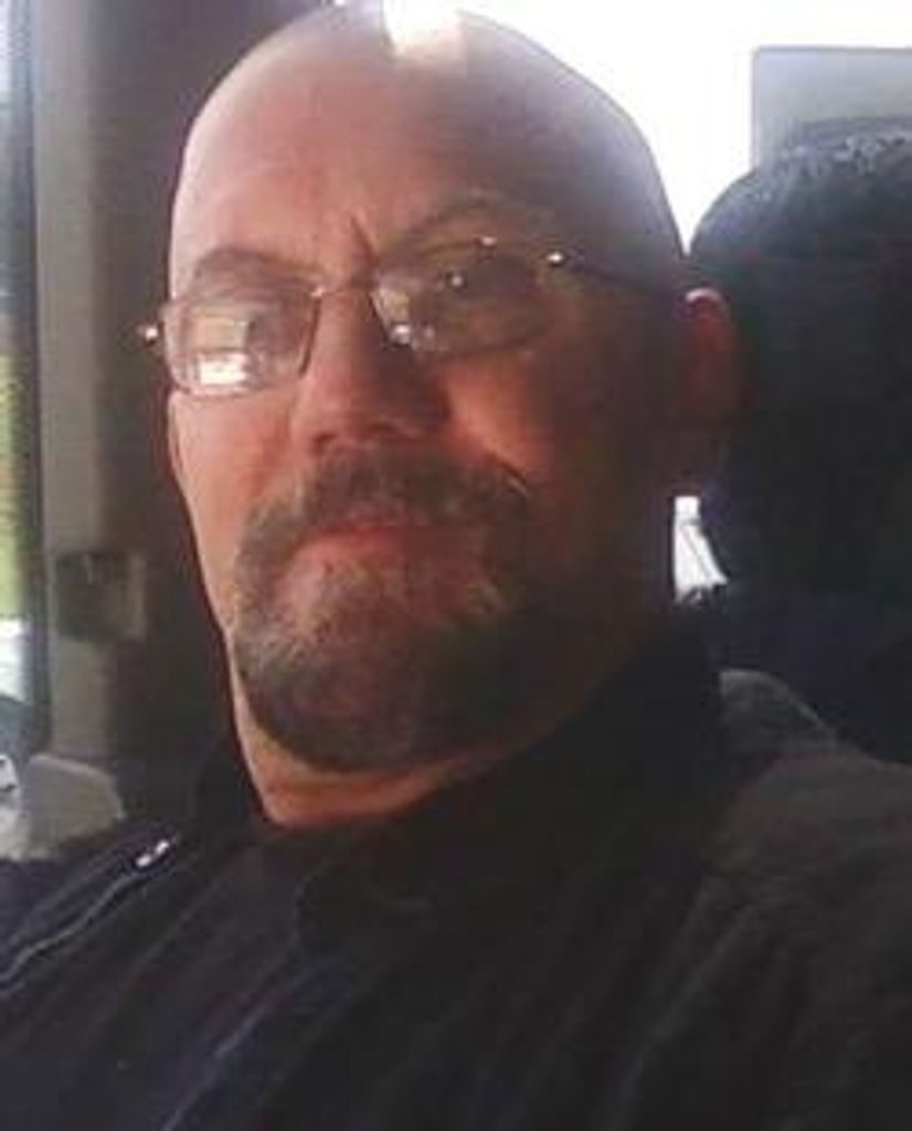 Douglas E. "Rick" Downing