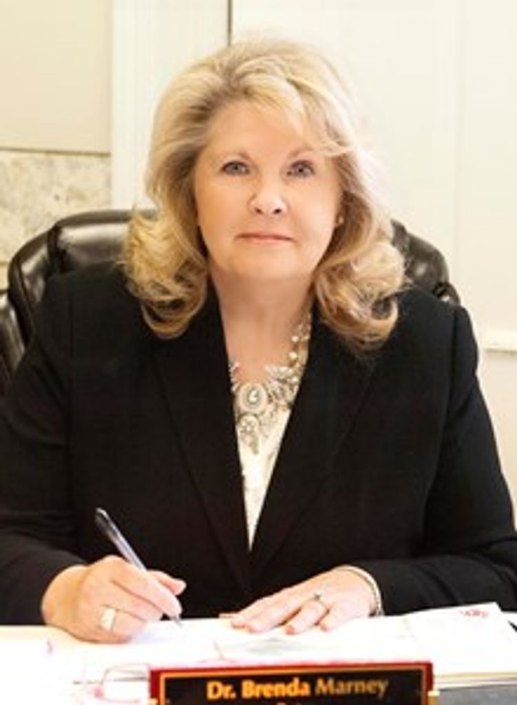 Dr. J. Marney