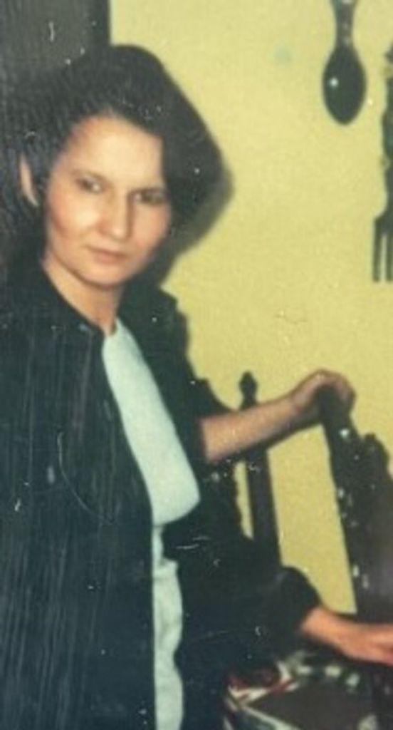 Olga "Yogi" R. Harris