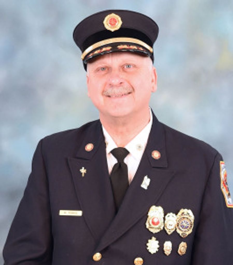 The Honorable Mark Tomko