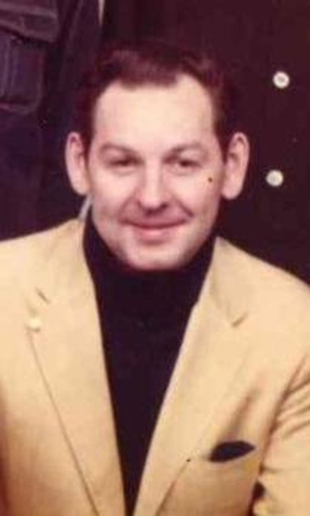 Harry E.  Mills, Jr.