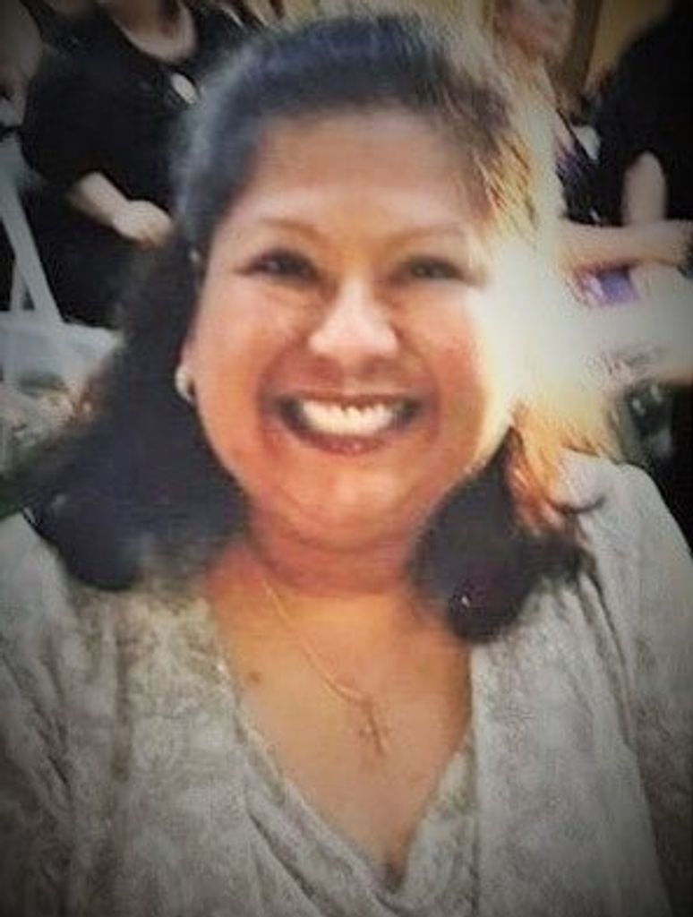 Suzanne Marie Flores