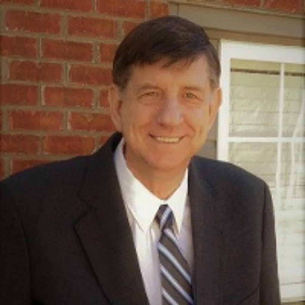 James C. "Buddy" Holcomb