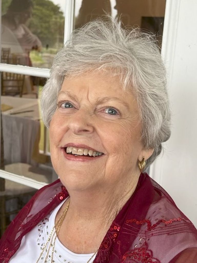 Elaine J Singleton