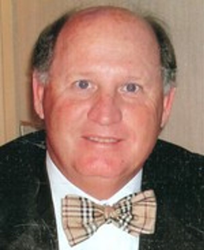 Scott E. Buttrey