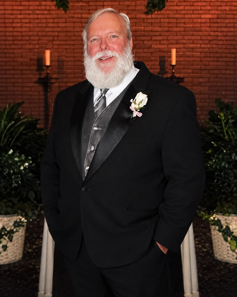 Kenny M. Burk