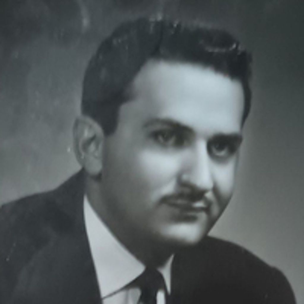 Gus  G. Katrouzos