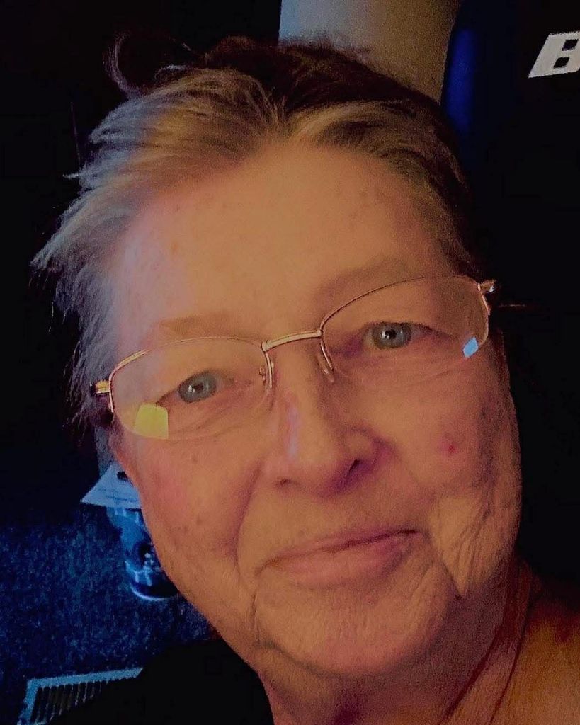 Deborah "Debbie" Button