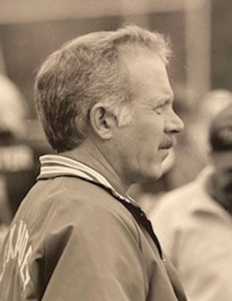 Dennis  E. Wolfley