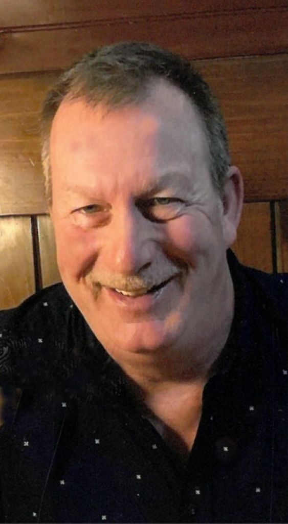 Robert J. "Bob" Arquiett