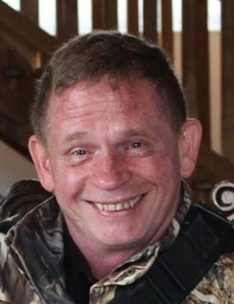 Mark A. Mann