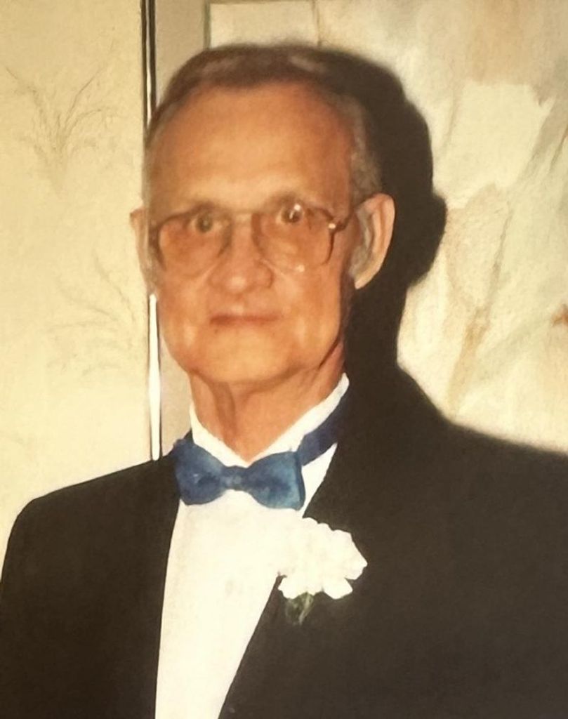 Curtis J Burns