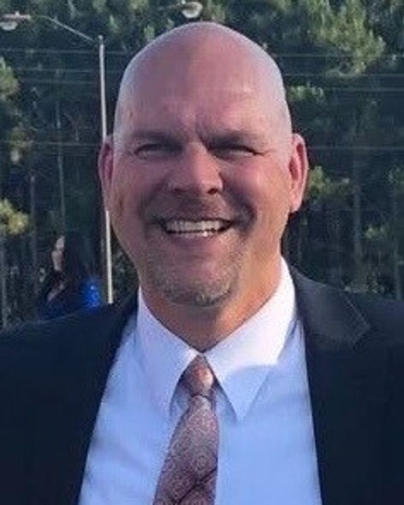 Greg L. Simpson