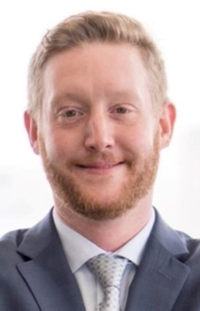 Adam J. Szymanski