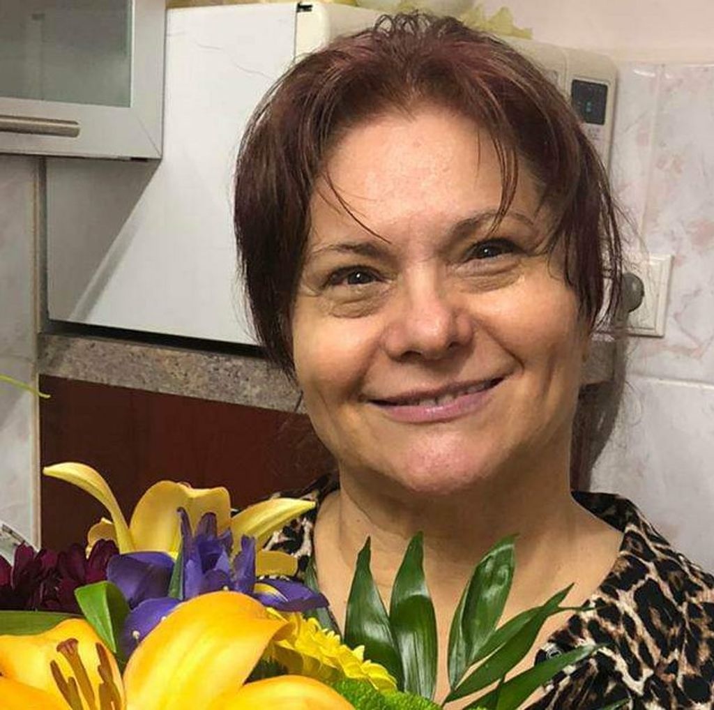 Georgeta R. Toth