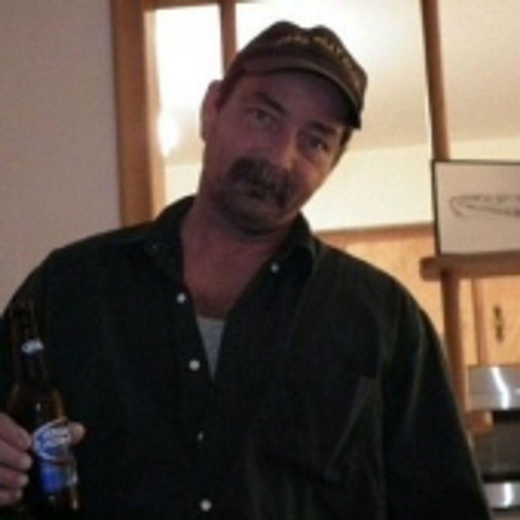 Mr Dennis Charles Guinn
