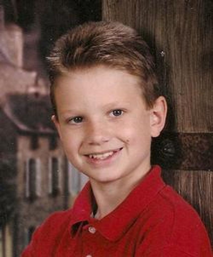 Travis Vernon Dodd, Jr. "Tj"