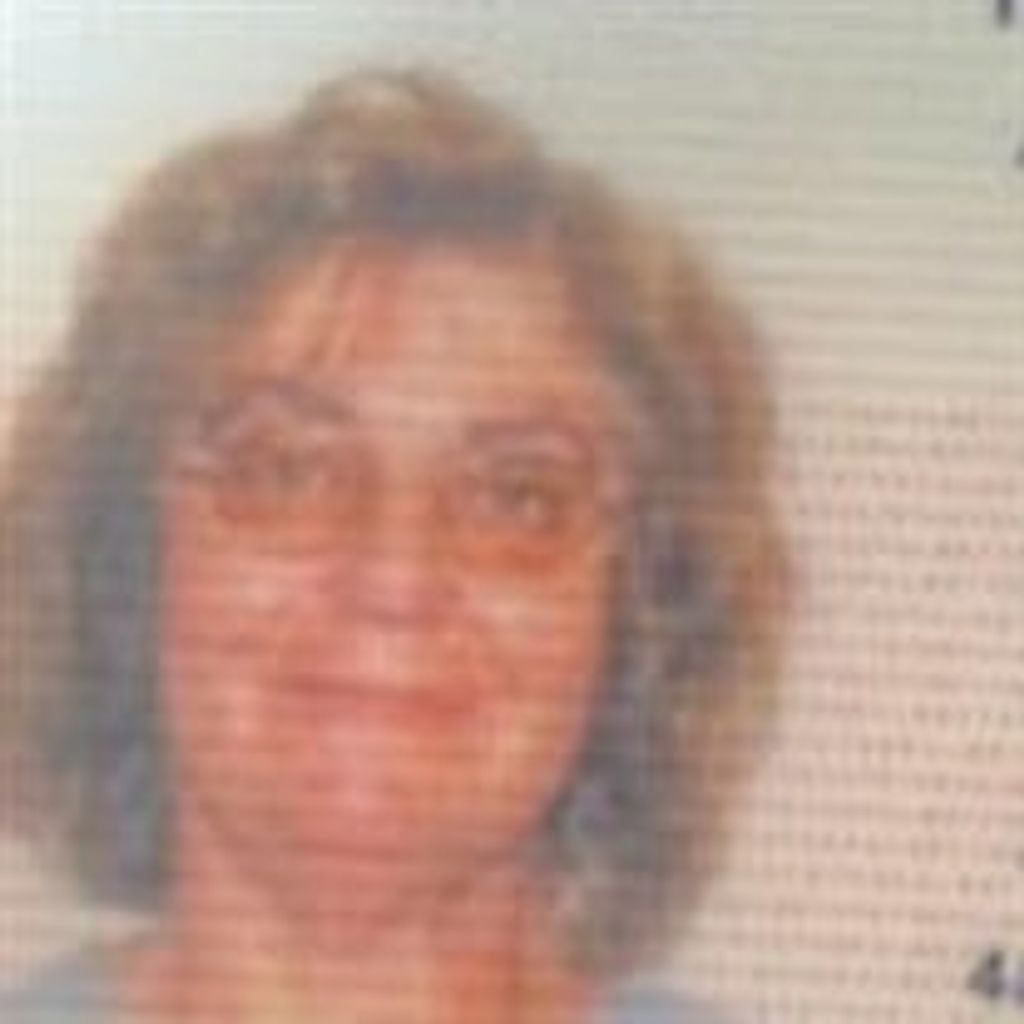 Carolann E Baca
