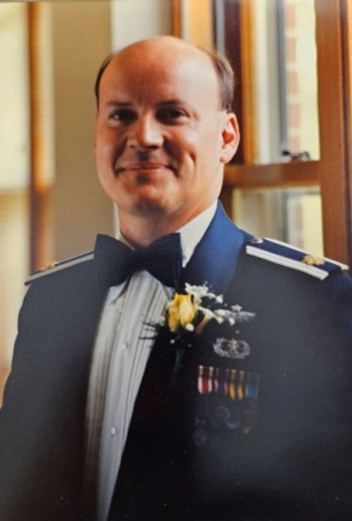 William L Tomson