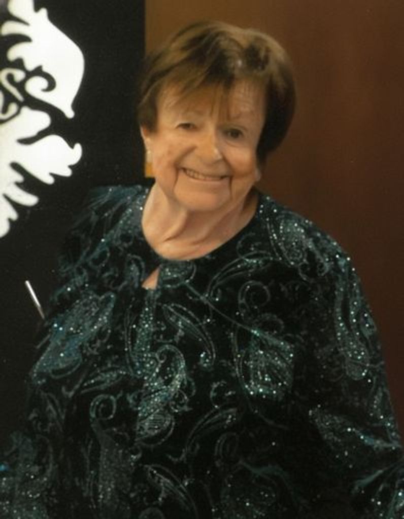 Anne E Mills
