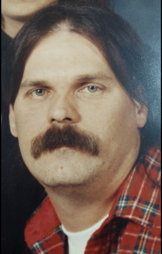 Raymond W Mcdaniels