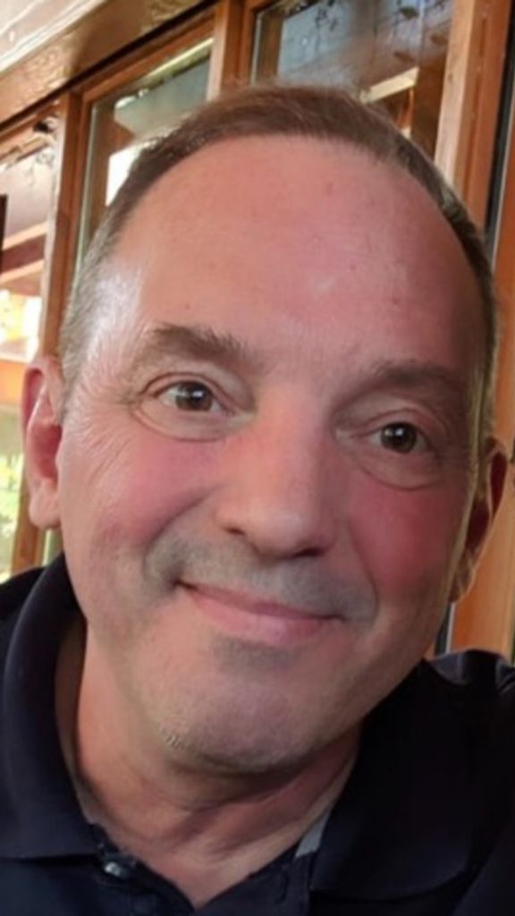 B. Dennis Tucker Profile Photo