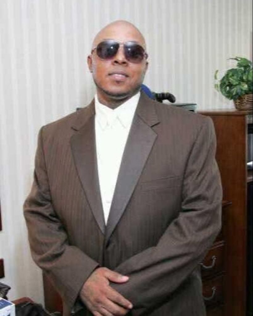Adrian B Tuck